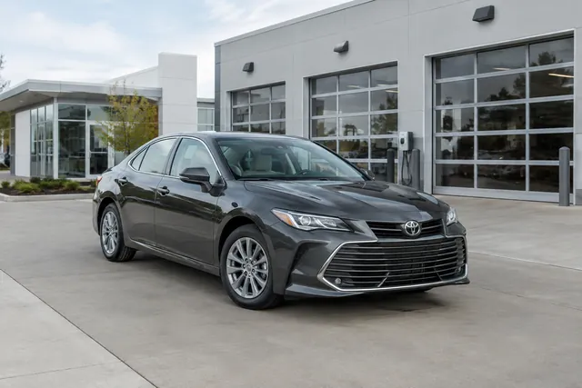 Toyota Avalon Hybrid parked at a service facility for a traction battery assessment