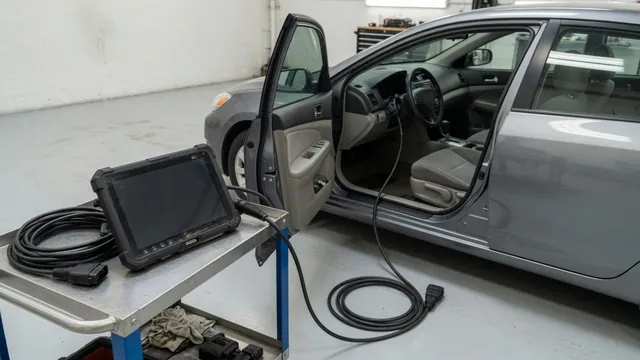 Diagnostic scan tool beside a parked vehicle with the engine off