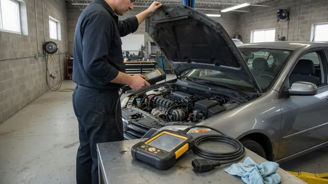 Diagnostic scan tool beside an engine bay during an upstream oxygen sensor inspection