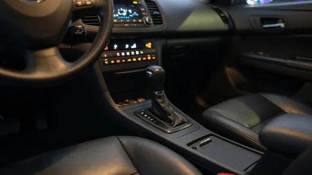 Automatic transmission gear selector and dashboard gear indicator with a check engine light