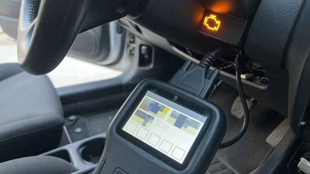 OBD-II scan tool plugged into a car's diagnostic port with the check engine light on in the background