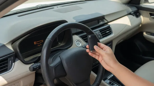 Driver holding a key fob beside a dashboard start button with a key-not-detected message visible.
