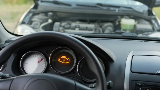 Engine temperature gauge and check engine light illustrating a cooling system performance concern