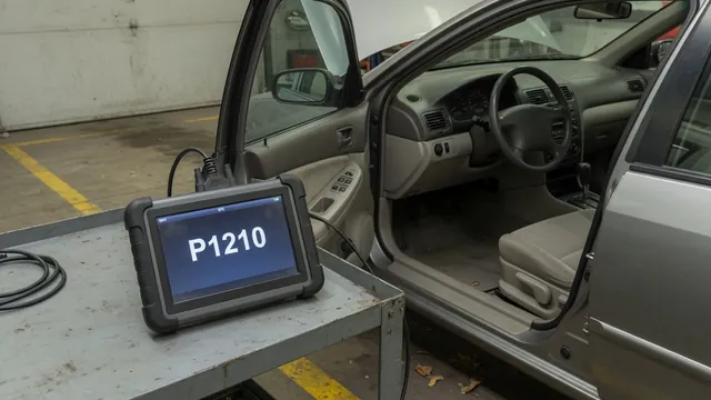 Diagnostic scan tool beside a vehicle dashboard displaying the P1210 trouble code