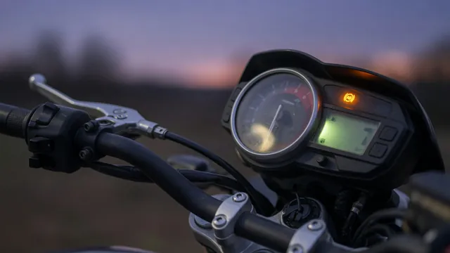 Amber ABS warning light lit on a motorcycle instrument cluster