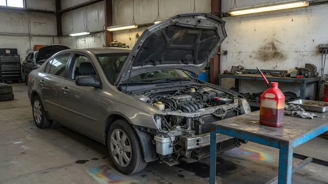 Open engine bay of a parked vehicle with a capped penetrating oil container on a nearby workbench.