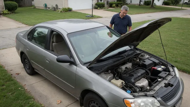 Parked car with its engine off and hood open for an initial engine noise inspection