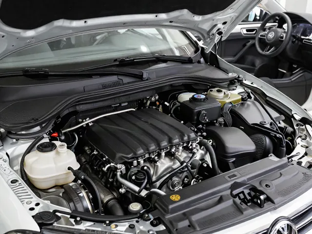 Brake fluid reservoir in a Volkswagen engine bay with the cap closed
