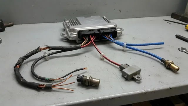 Labeled diagram of a vehicle control module supplying reference voltage to several sensor branches