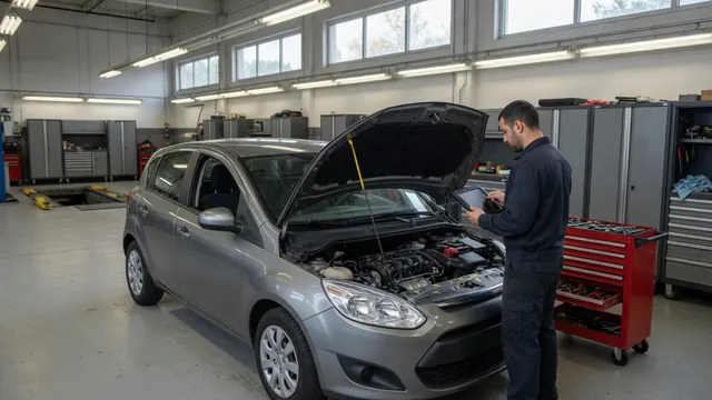 Technician reviewing diagnostic fault codes beside a parked vehicle with its hood open