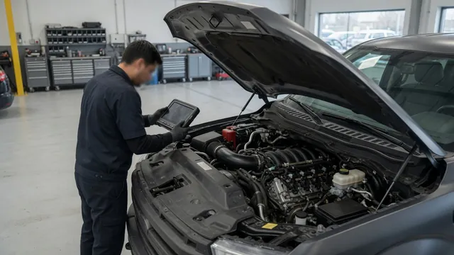 Technician reviewing diagnostic codes on a scan tool beside a diesel engine with fuel lines intact