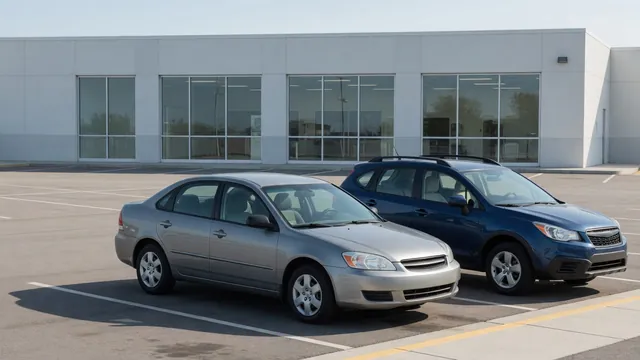 Ford Edge and Lincoln MKX parked outside an automotive service center