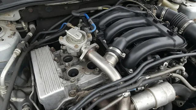 EGR valve and connecting metal passage in an engine bay with the engine off