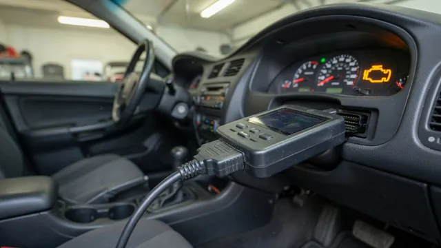 OBD-II scan tool plugged into a car's diagnostic port while the check engine light glows on the dashboard