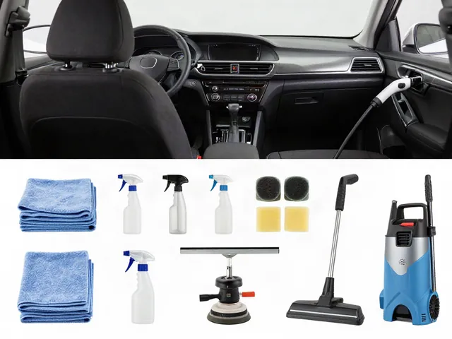 Car detailing tools arranged on a clean workbench, including microfiber towels, sprayers, pads, and a vacuum