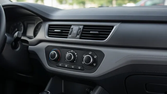 Car dashboard showing climate controls and center air vents during an HVAC symptom check
