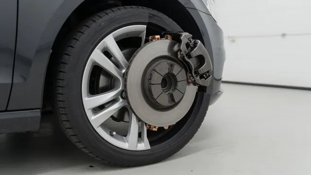 Car wheel and disc brake assembly with the brake pad and rotor surface visible