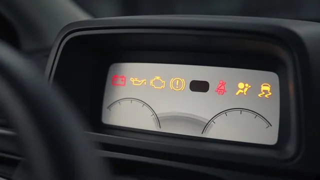 Car instrument cluster at startup with warning lights glowing and one warning spot left dark