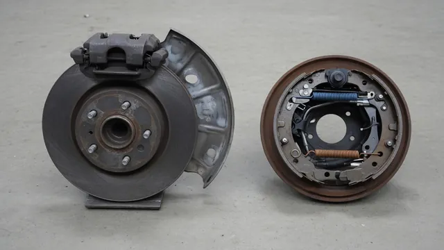 Rear disc brake and drum brake assemblies showing the rotor, dust shield, brake shoes and springs
