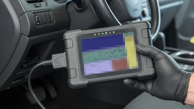 Handheld OBD-II scan tool connected under a car dashboard to read a P1353 trouble code