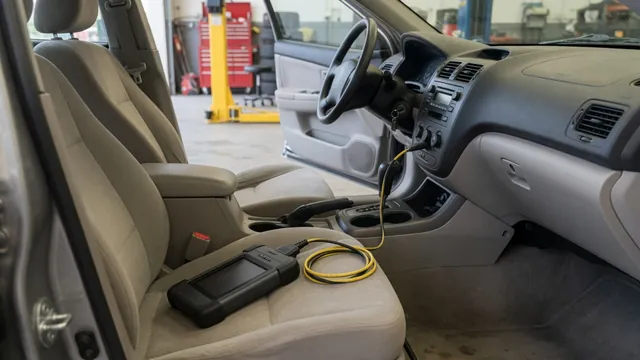 Diagnostic scan tool connected inside a parked vehicle during a P1150 code check