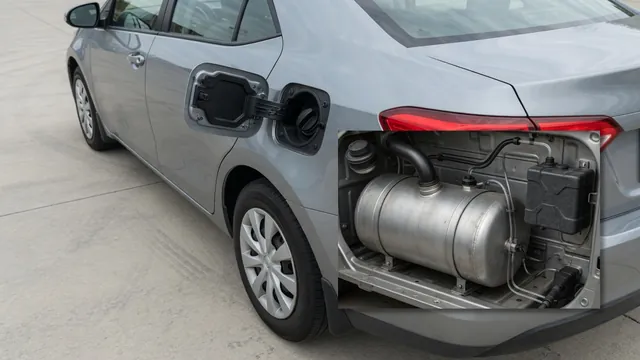 Fuel filler and gas cap with a conceptual diagram of an automotive EVAP vapor containment system