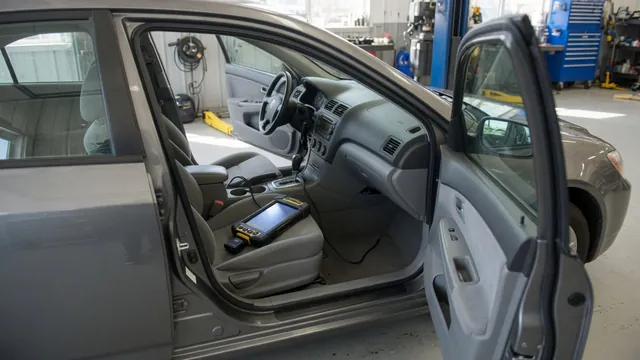 Diagnostic scanner connected inside a parked vehicle during a P1790 code assessment