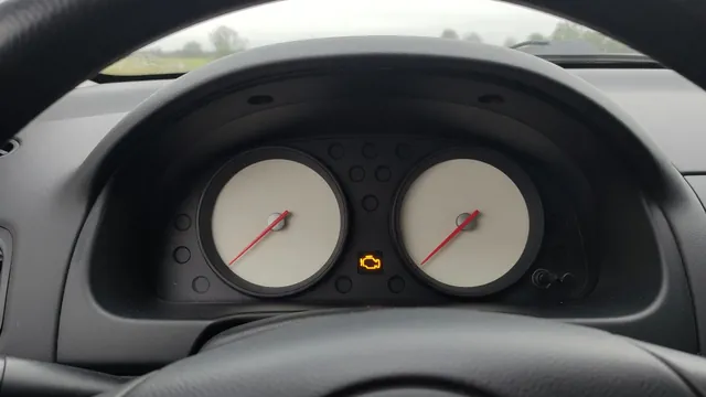 Lexus instrument cluster with an illuminated amber check engine symbol