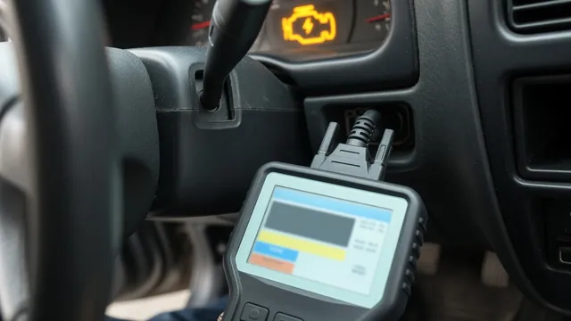 OBD-II scan tool connected under a dashboard reading a trouble code while the check engine light is on