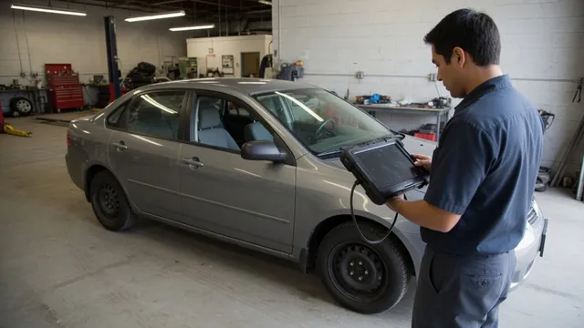 Technician reviewing a diagnostic scanner beside a parked vehicle with its engine off