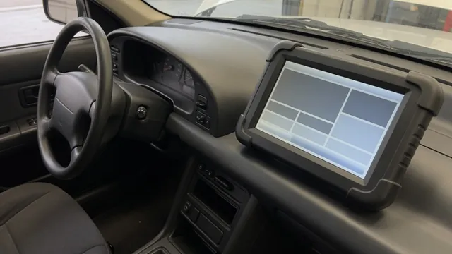 Diagnostic scanner beside a vehicle dashboard displaying the P1235 trouble code