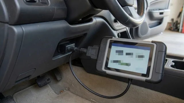 OBD-II scan tool connected under a car dashboard displaying a diagnostic trouble code
