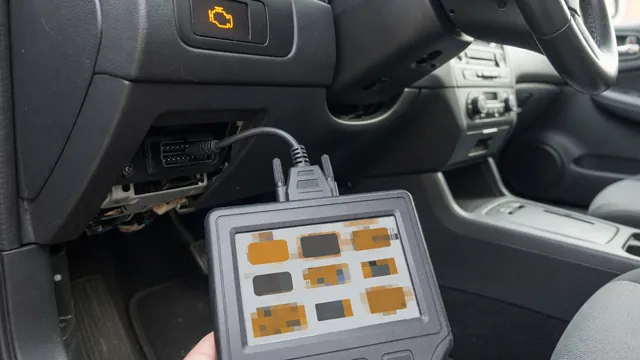 OBD-II scan tool plugged into a car's diagnostic port with the check engine light on in the background