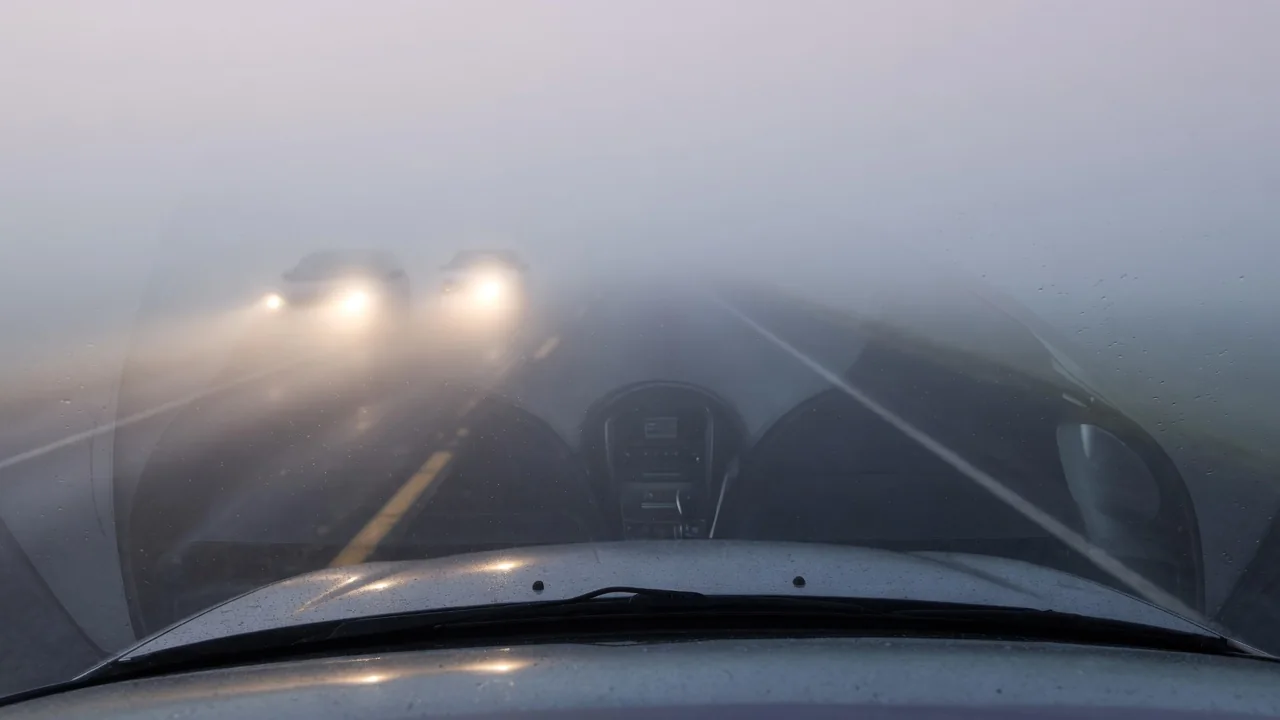 Automotive scene illustrating Why Does Fog Make Distance Hard to Judge