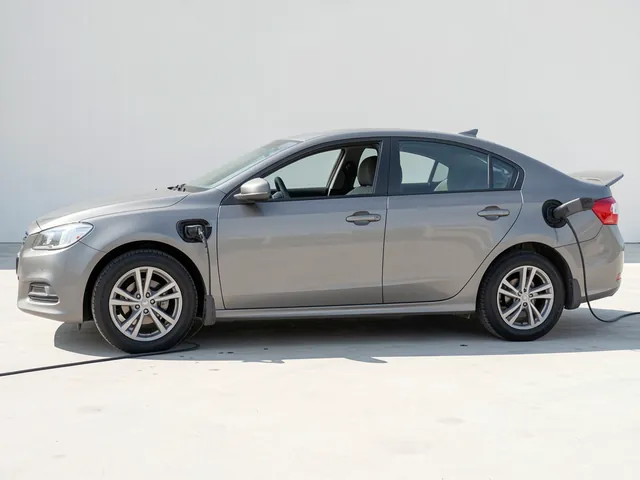 Used car parked over a dry inspection area with its wheel arches and lower body clearly visible