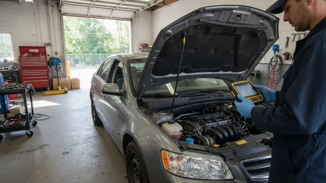 Technician reviewing diagnostic scan data beside a vehicle with its hood open